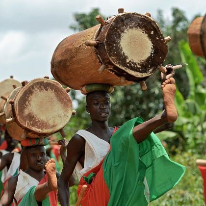 97feafd60f755b9781_Gishora Drum Sanctuary - Burundi men carrying drum